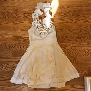 100% silk Bebe halter dress with lining.